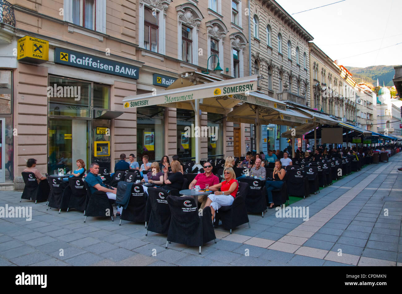 Cafe bar terraces fill Strosmajerova street in central Sarajevo city Bosnia and Herzegovina Europe Stock Photo