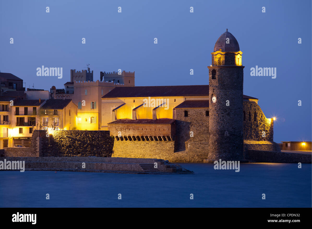 The Church of Notre-Dame-des-Anges at dusk from the harbour at Collioure, Cote Vermeille, Languedoc-Roussillon, France, Europe Stock Photo
