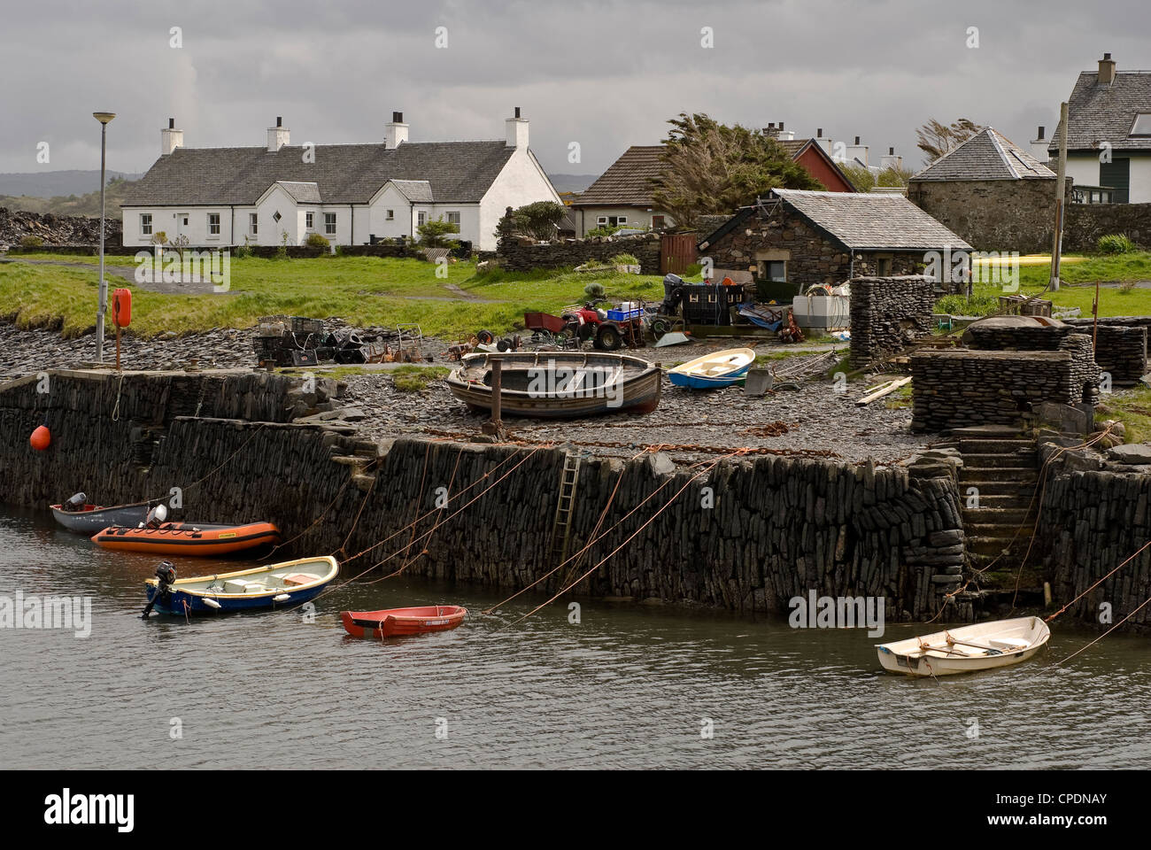 Cottages and the ferry dock on Easdale Island a slate island south west