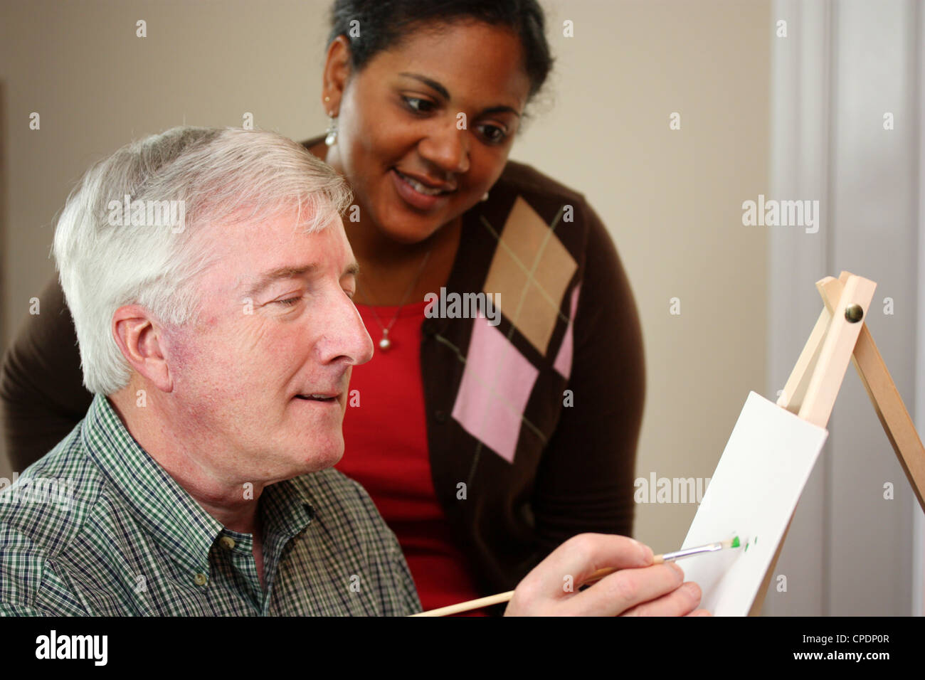 Man painting canvas hi-res stock photography and images - Alamy