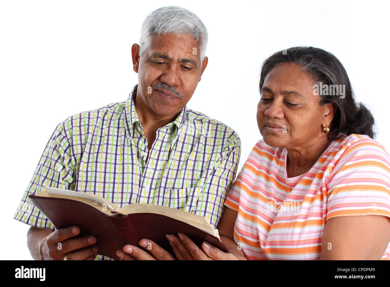 Senior Minority Couple Set On A White Background Reading Stock Photo