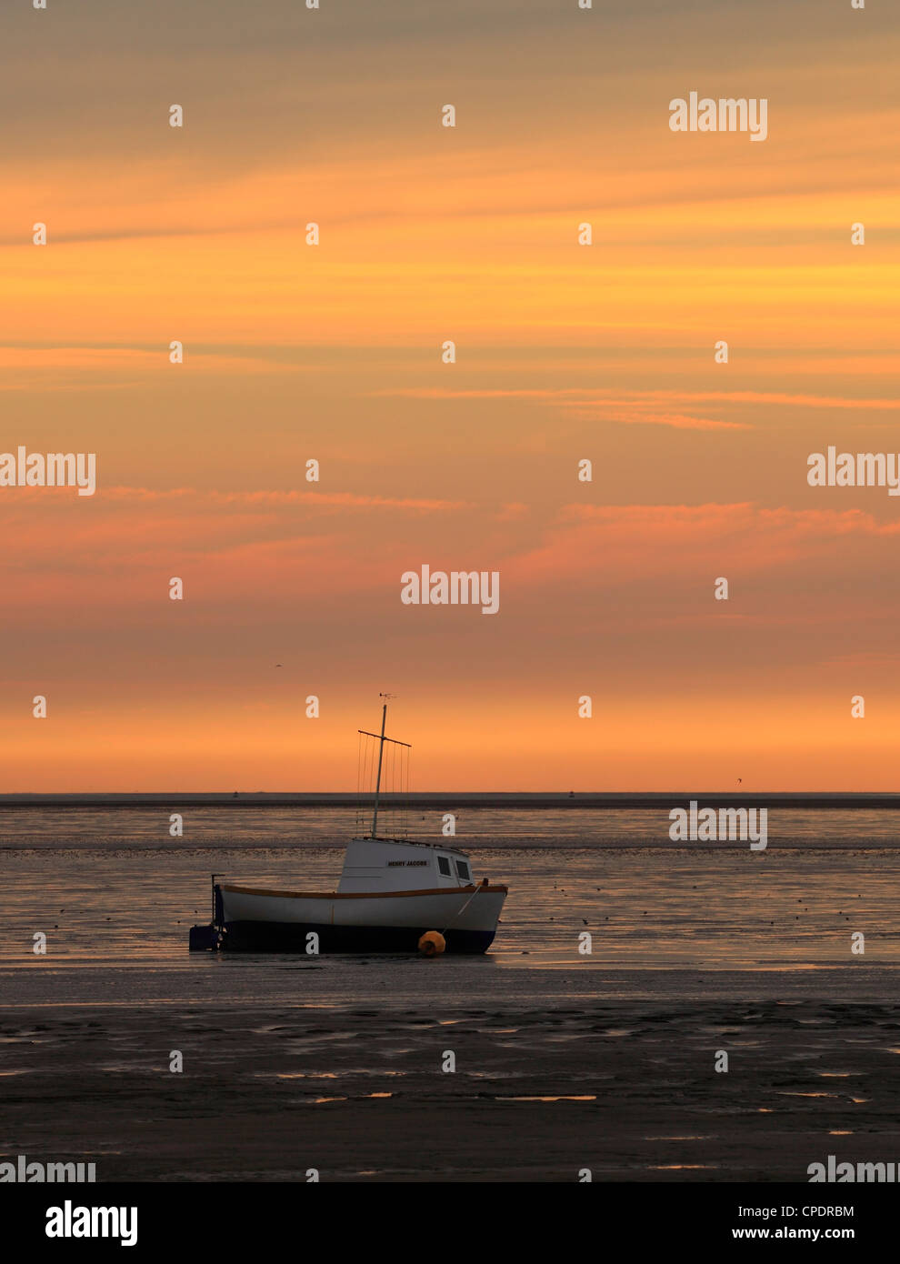 Looking across The Wash estuary at sunset from Snettisham, Norfolk. Stock Photo