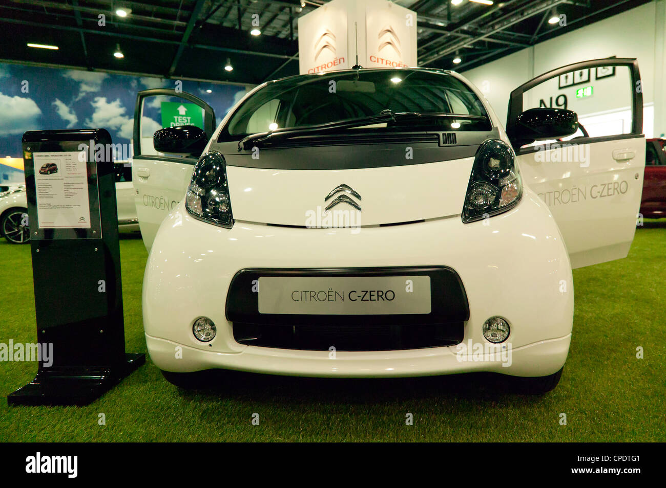 Front view of a Citroën C-Zero Hatchback electric car on display at ecovelocity 2012 Stock Photo