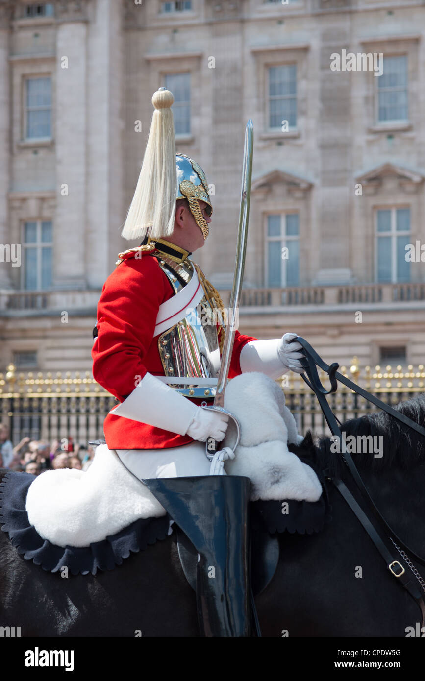 A mounted Queens Life guard outside Buckingham Palace, London, UK. Stock Photo