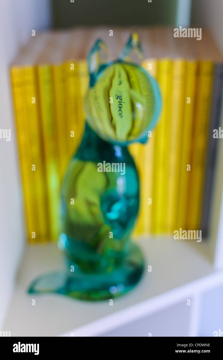Cat shaped glass ornament. Soft focus picture. Stock Photo