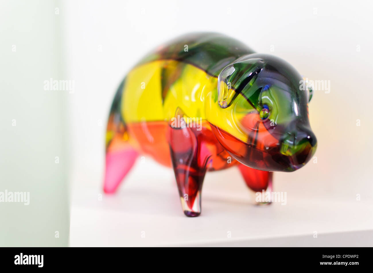 Pig shaped multicolored glass ornament Stock Photo