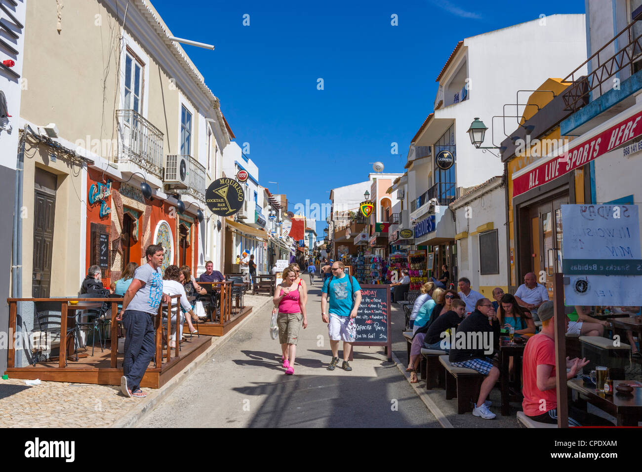 Shops and bars in the centre of the resort of Alvor, near Portimao, Algarve, Portugal Stock Photo