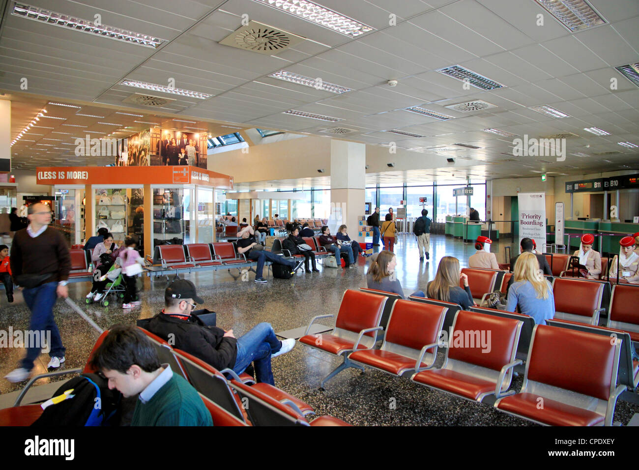 People waiting for boarding at an airport gate Stock Photo Alamy