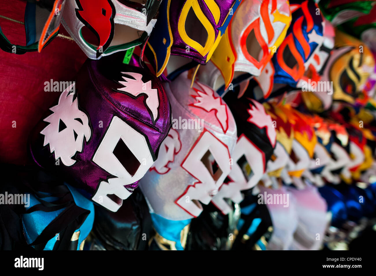 Colorful Lucha libre (Mexican wrestling) masks for sale on a stall at a