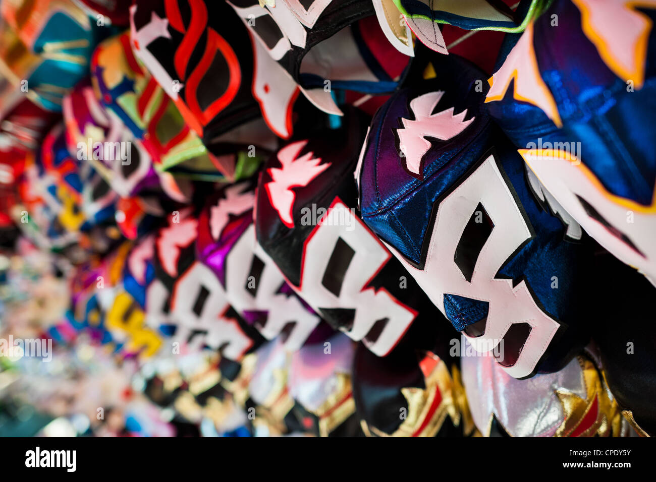 Colorful Lucha libre (Mexican wrestling) masks for sale in a street shop in Mexico City, Mexico. Stock Photo