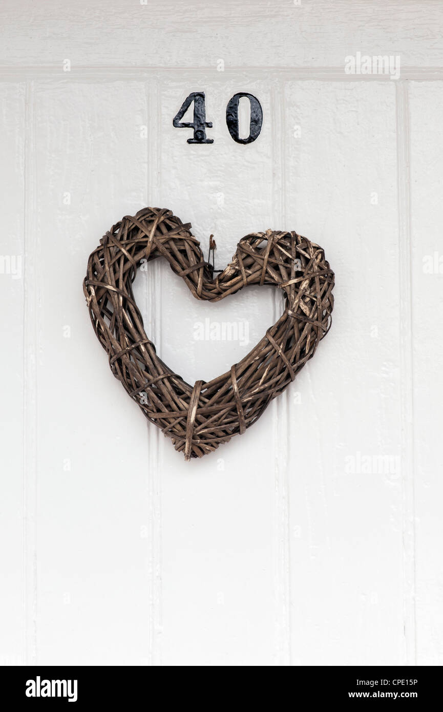 Craft Wooden heart on a front door Stock Photo