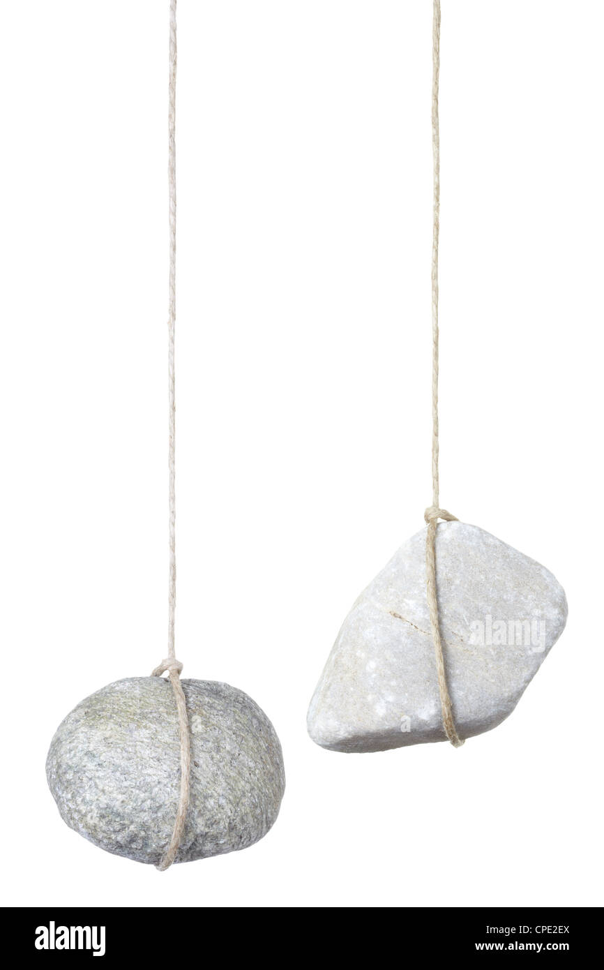 Stone hanging on a string Stock Photo