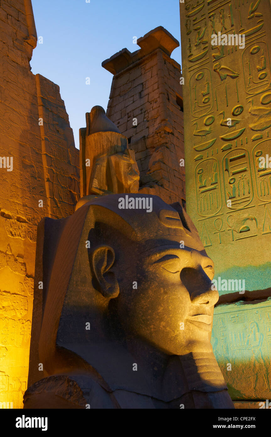 Statue of the pharaoh Ramesses II and Obelisk, Temple of Luxor, Thebes ...