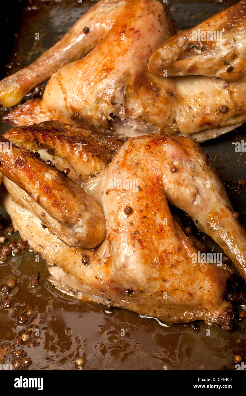roasted chicken halves Stock Photo Alamy