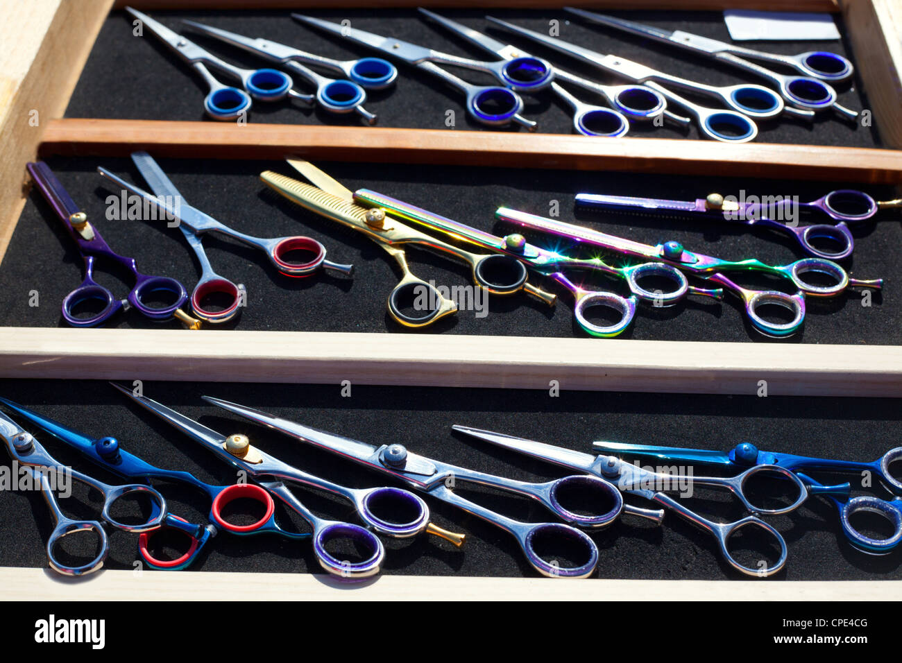 colorful hairdressing scissors titanium professional stuff Stock Photo