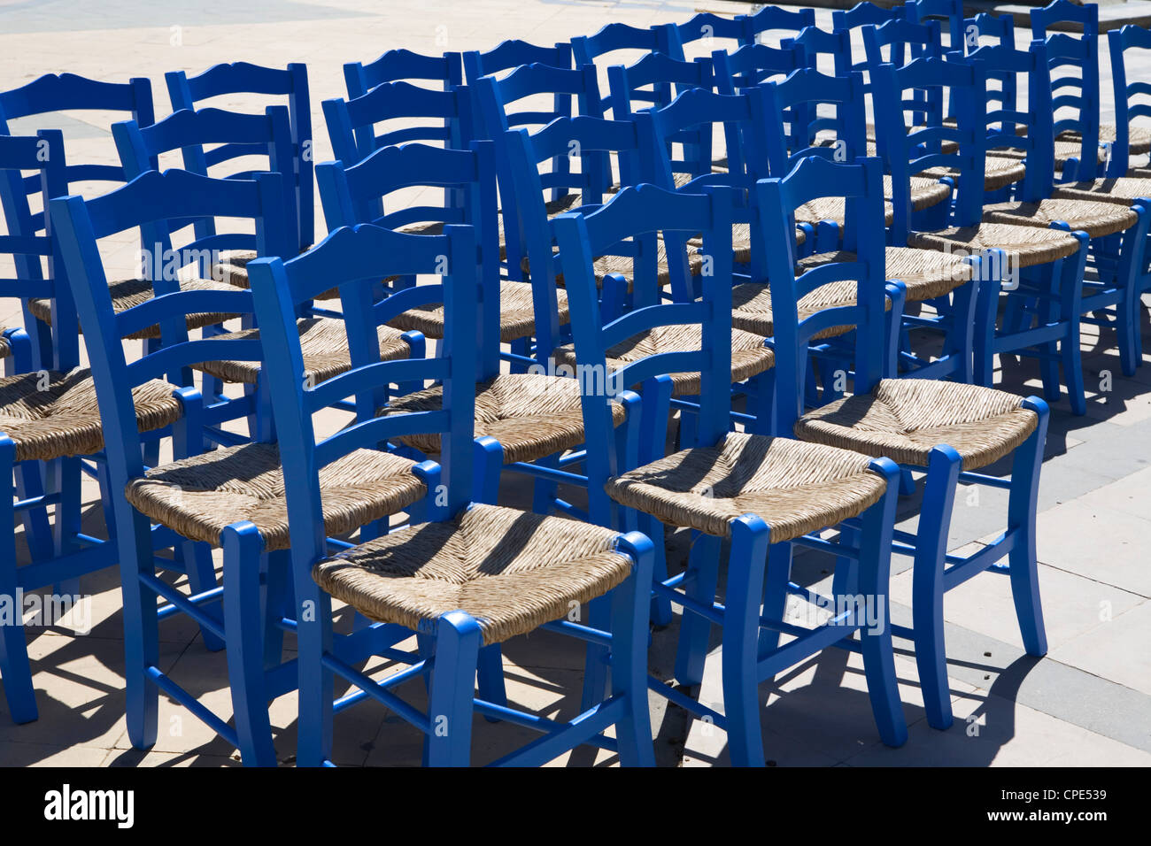 Blue Greek restaurant chairs, Crete, Greek Islands, Greece, Europe