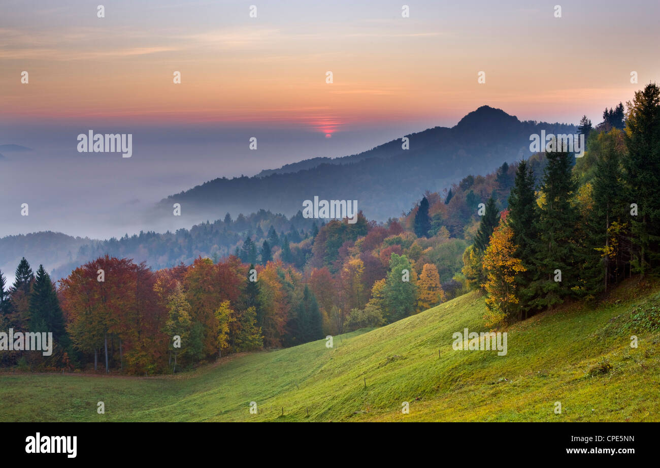 Mist over the Ljubljana Basin at sunrise in autumn, Central Slovenia, Slovenia, Europe Stock Photo