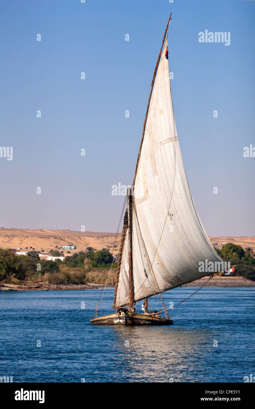 Old felucca laden with rocks on the River Nile near Aswan, Egypt, North Africa, Africa Stock Photo