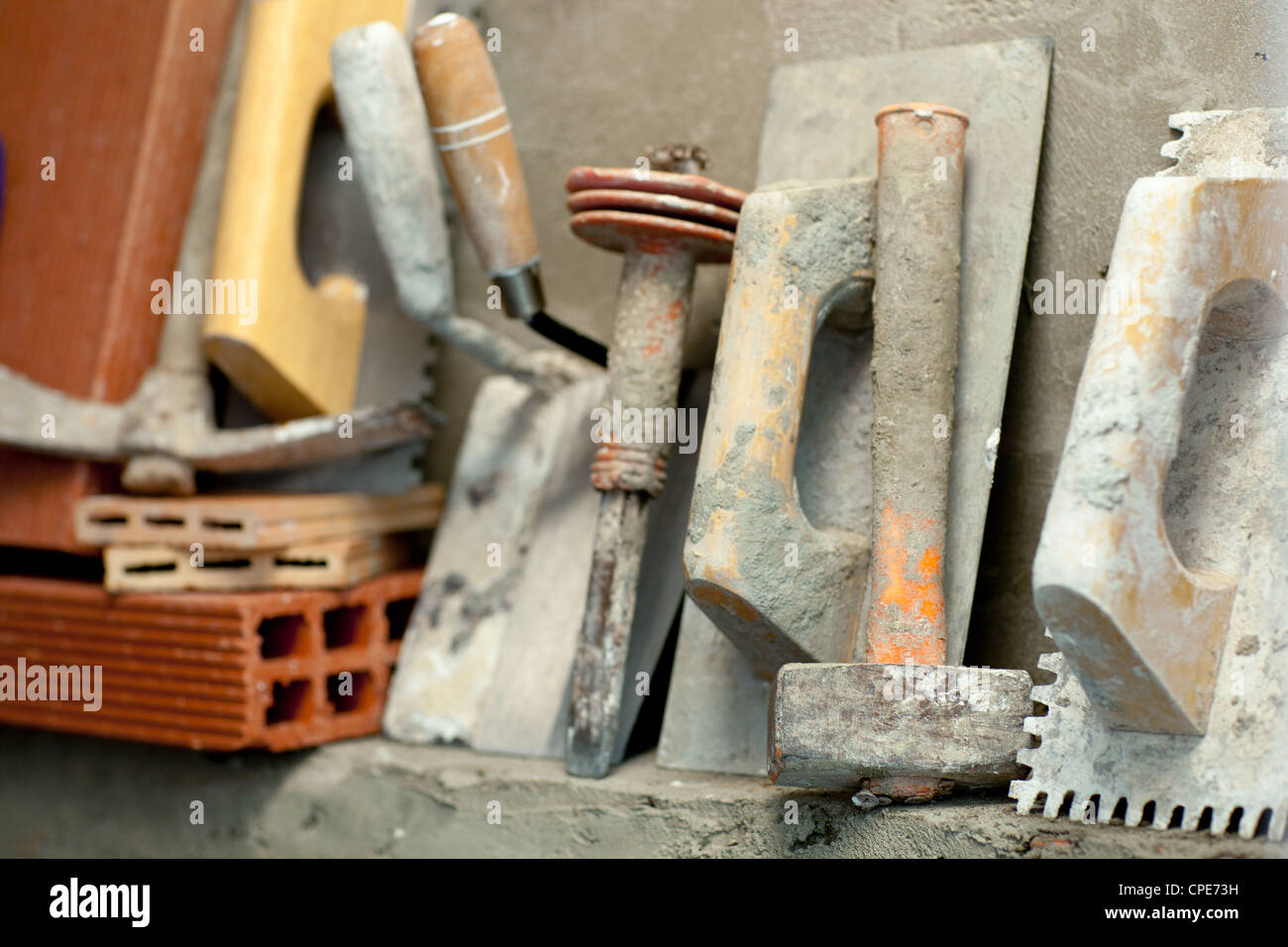 Construction mason cement mortar tools in a row Stock Photo Alamy