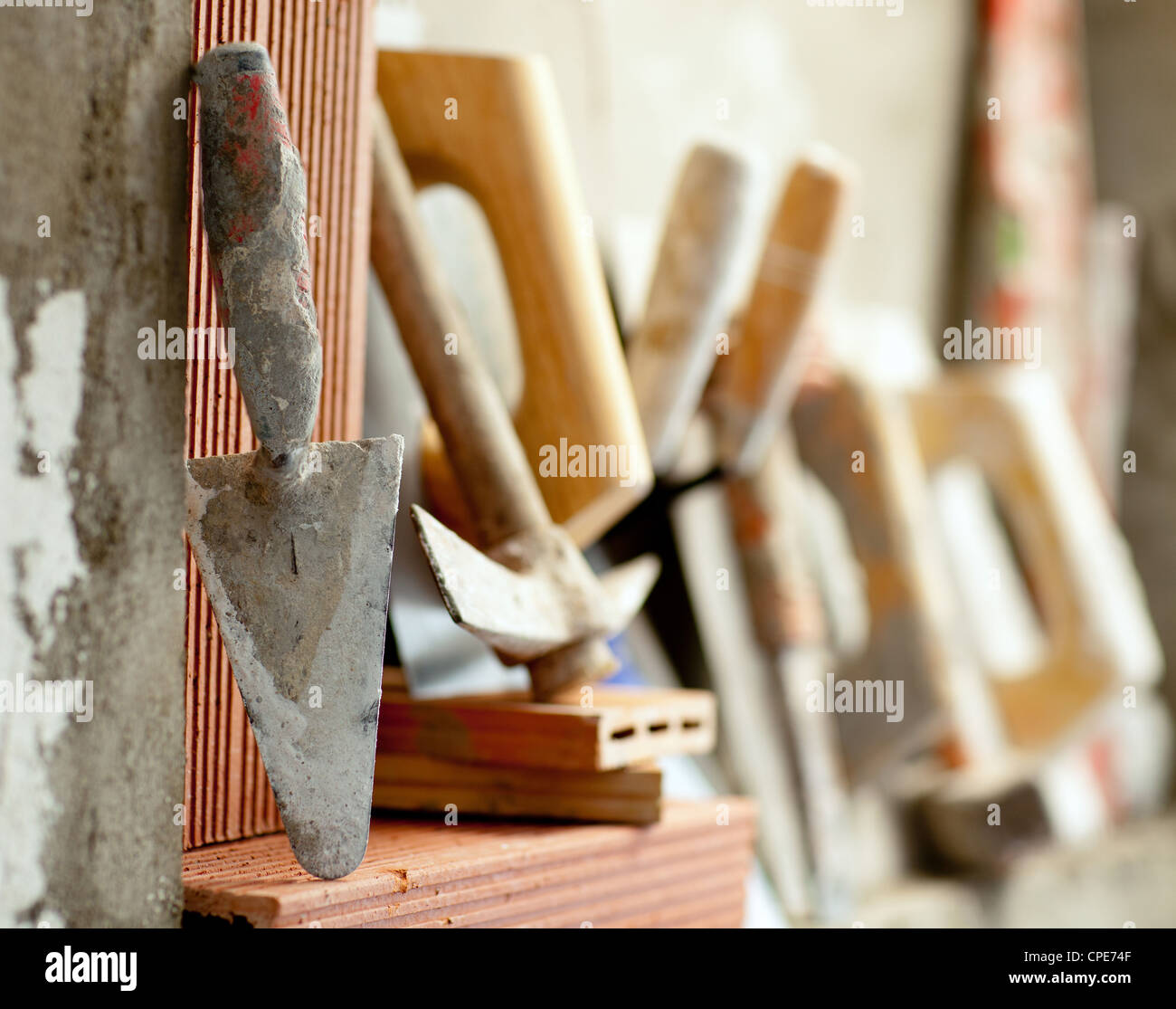 Construction mason cement mortar tools in a row Stock Photo Alamy