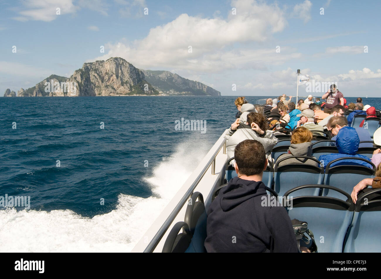 island of capri near sorrento  amalfi coast italy italian boat boats ferry ferries tourist tourists tourism people Stock Photo