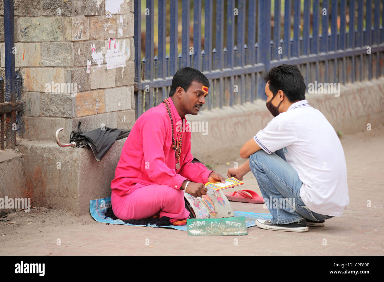 Fortune teller with client Kathmandu Nepal Stock Photo Alamy