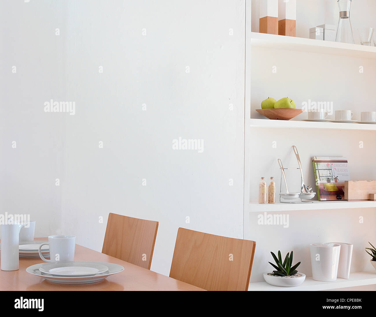 Modern Dining Room And Shelving Stock Photo