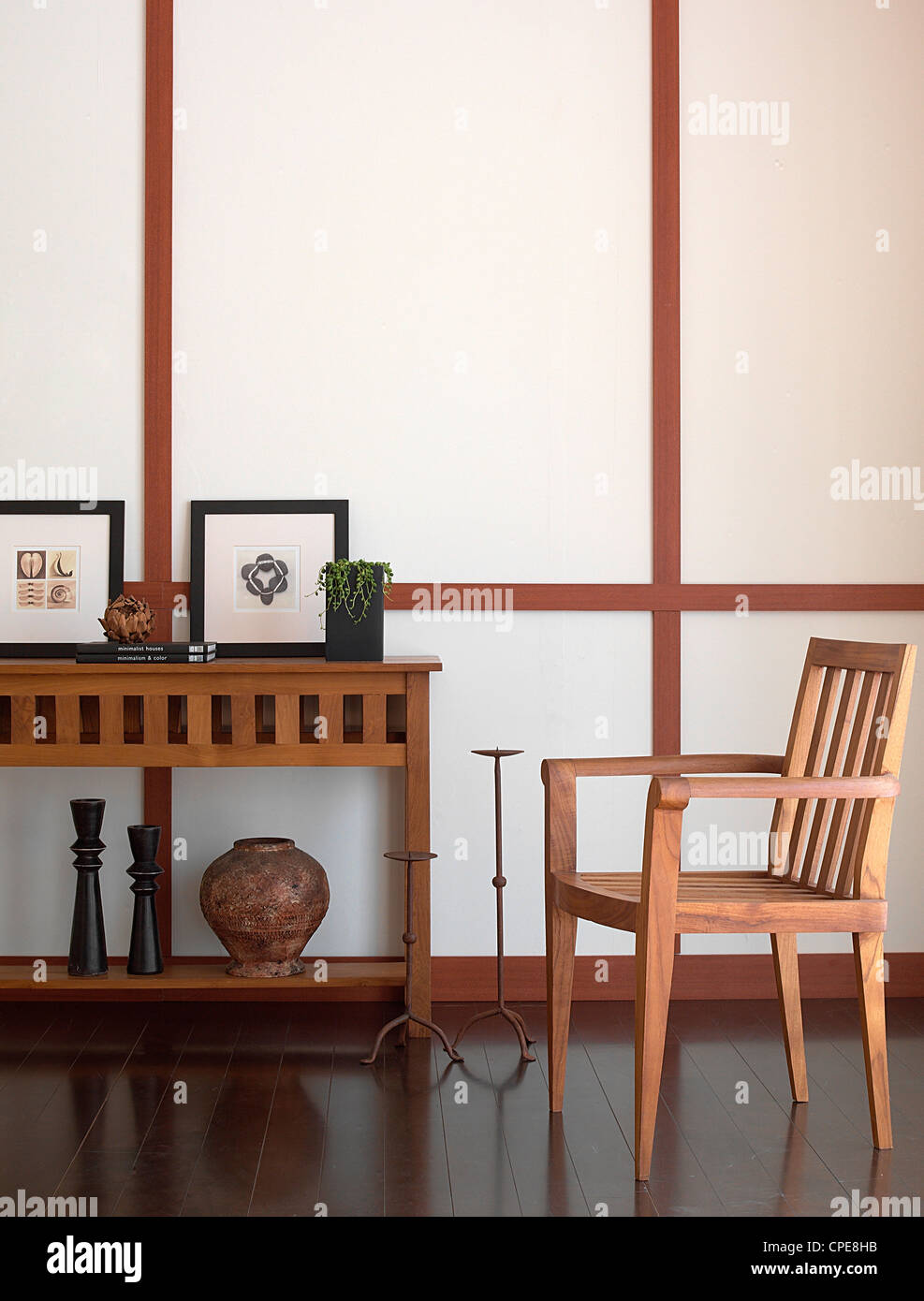 Wooden Chair And Table In A Side Of A Room Stock Photo