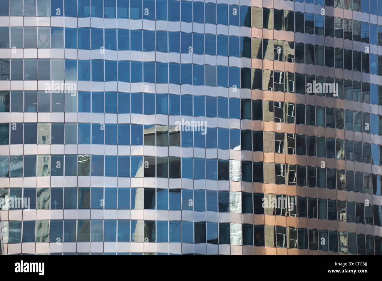 Buildings reflecting in a building in the La Defense district, Paris, France, Europe Stock Photo