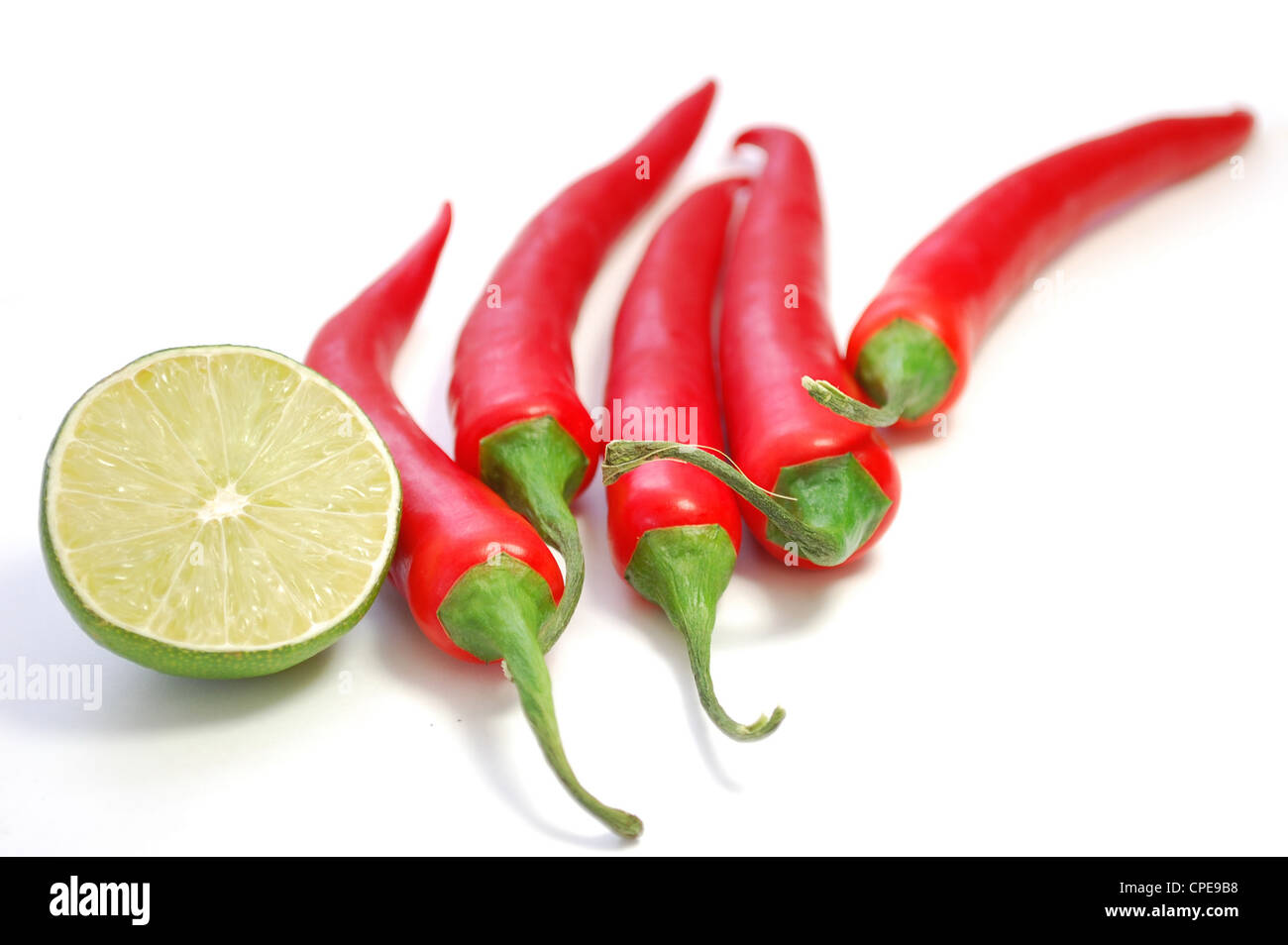 Chili peppers and lime Stock Photo Alamy
