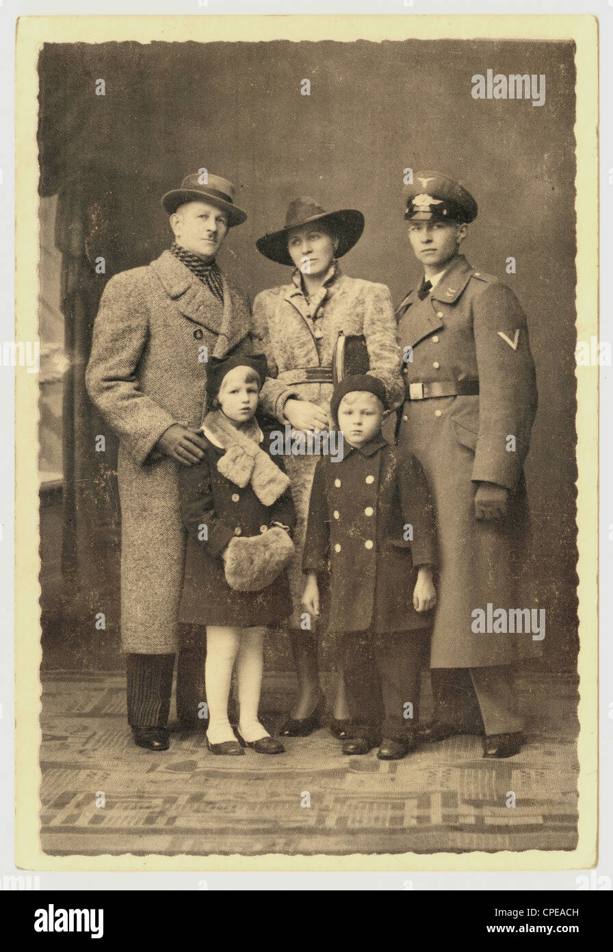 Postcard of family, probably German - the eldest son is in uniform, Luftwaffe, 1938, WWii) Germany Stock Photo