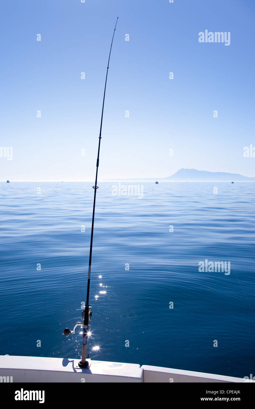 boat fishing rod in mediterranean blue sea in Spain Stock Photo
