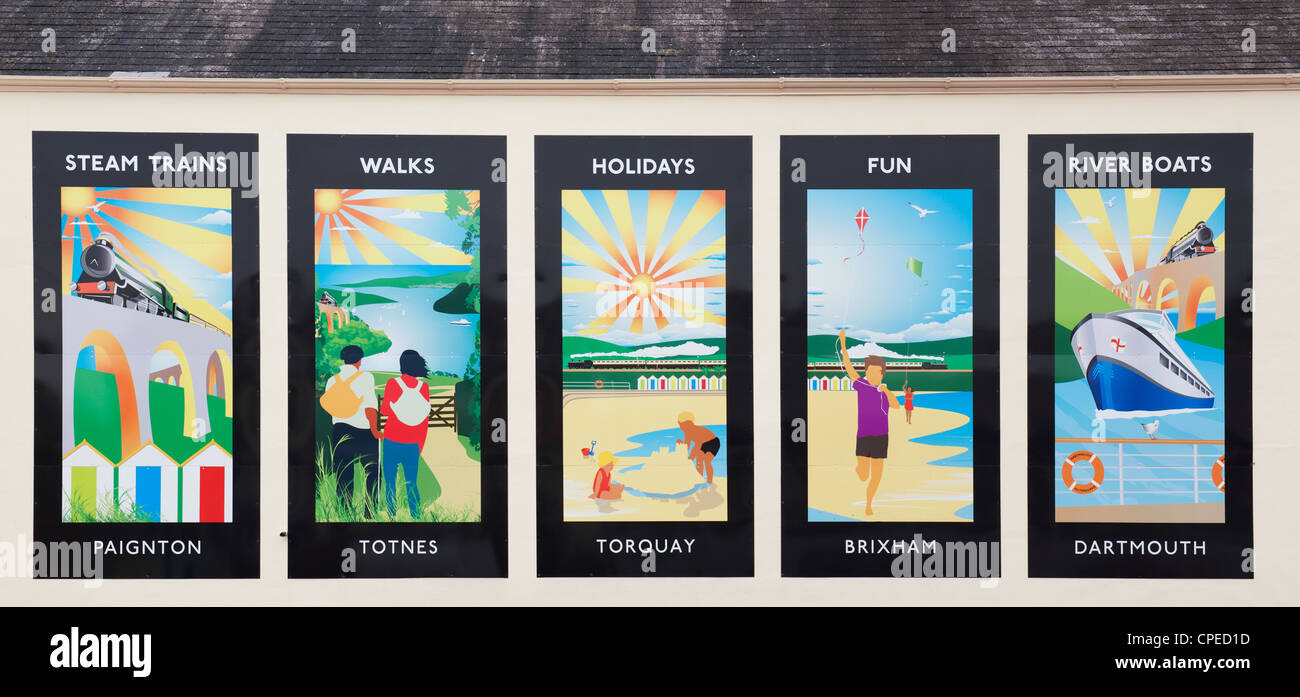 Colourful seaside tourist posters in Paignton, Devon, England Stock Photo
