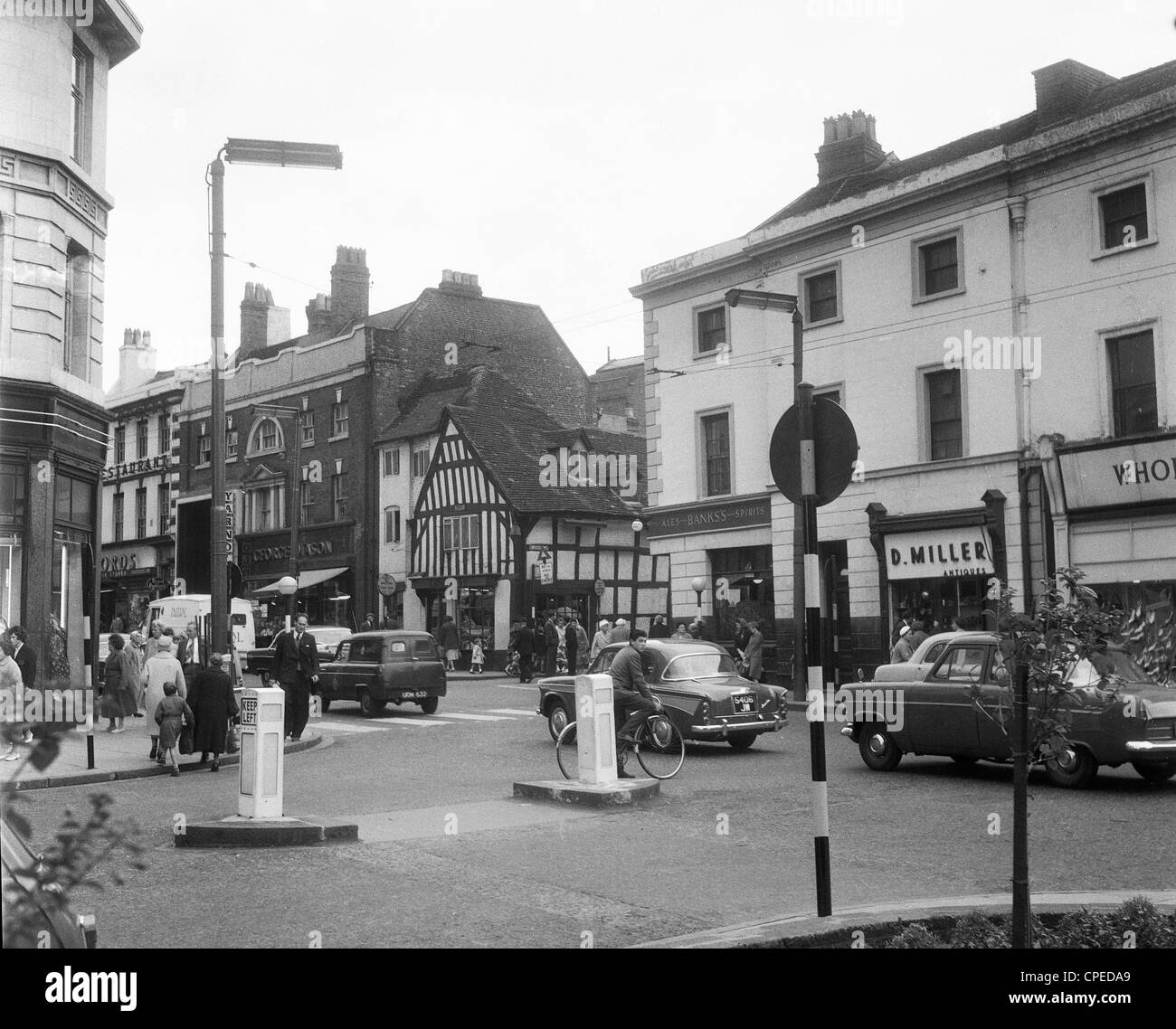 Wolverhampton city centre street scene in Victoria Street Wolverhampton 1960. The half timbered is one of the oldest in the city Stock Photo