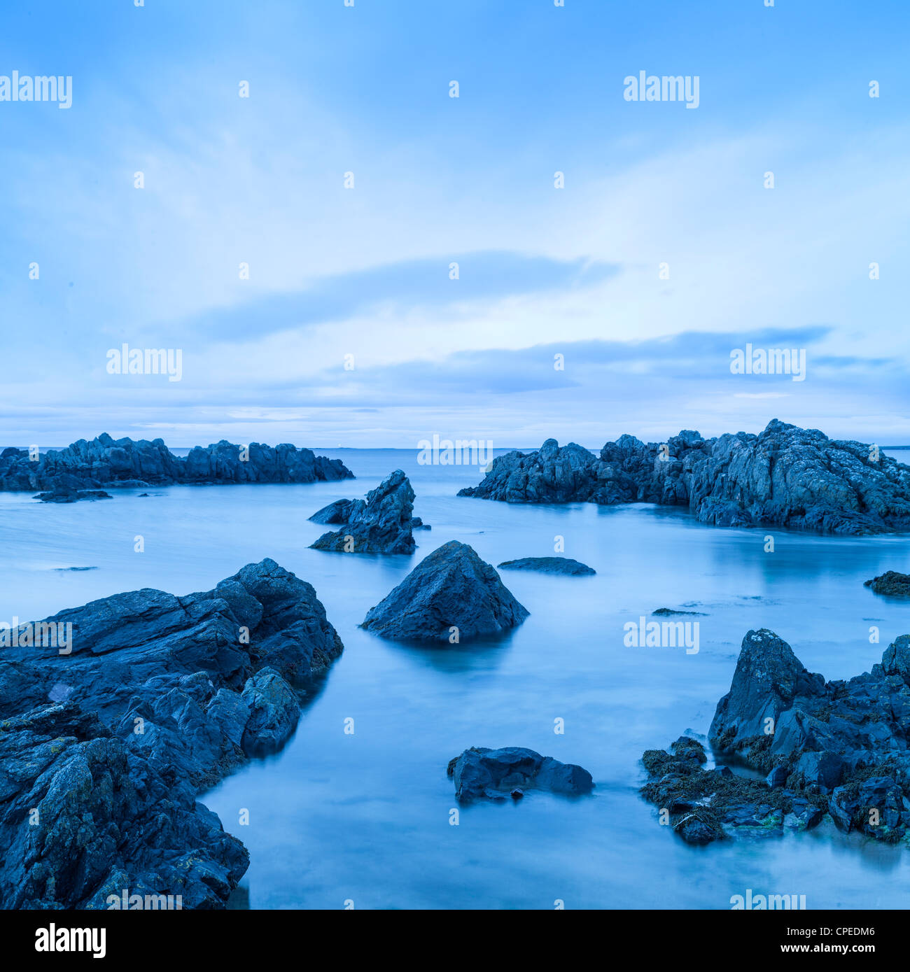 Northumberland beach before dawn, Bamburgh, England, Stock Photo