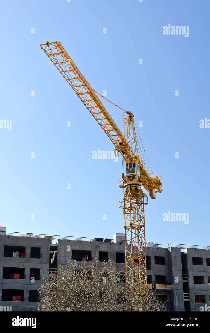 Tower crane near building under construction Stock Photo Alamy