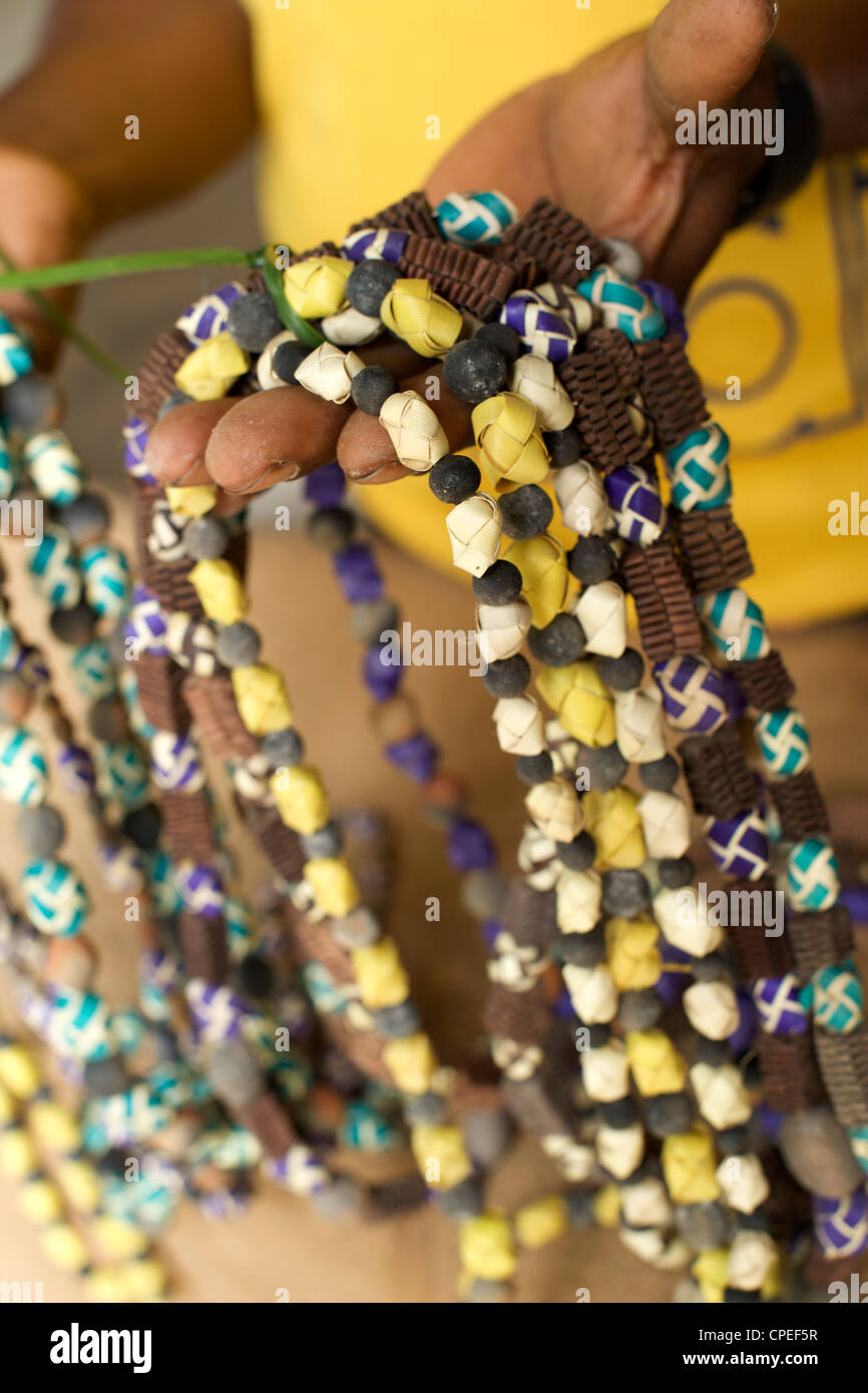 Handmade necklaces in Guludo village in the Quirimbas National Park in northern Mozambique. Stock Photo