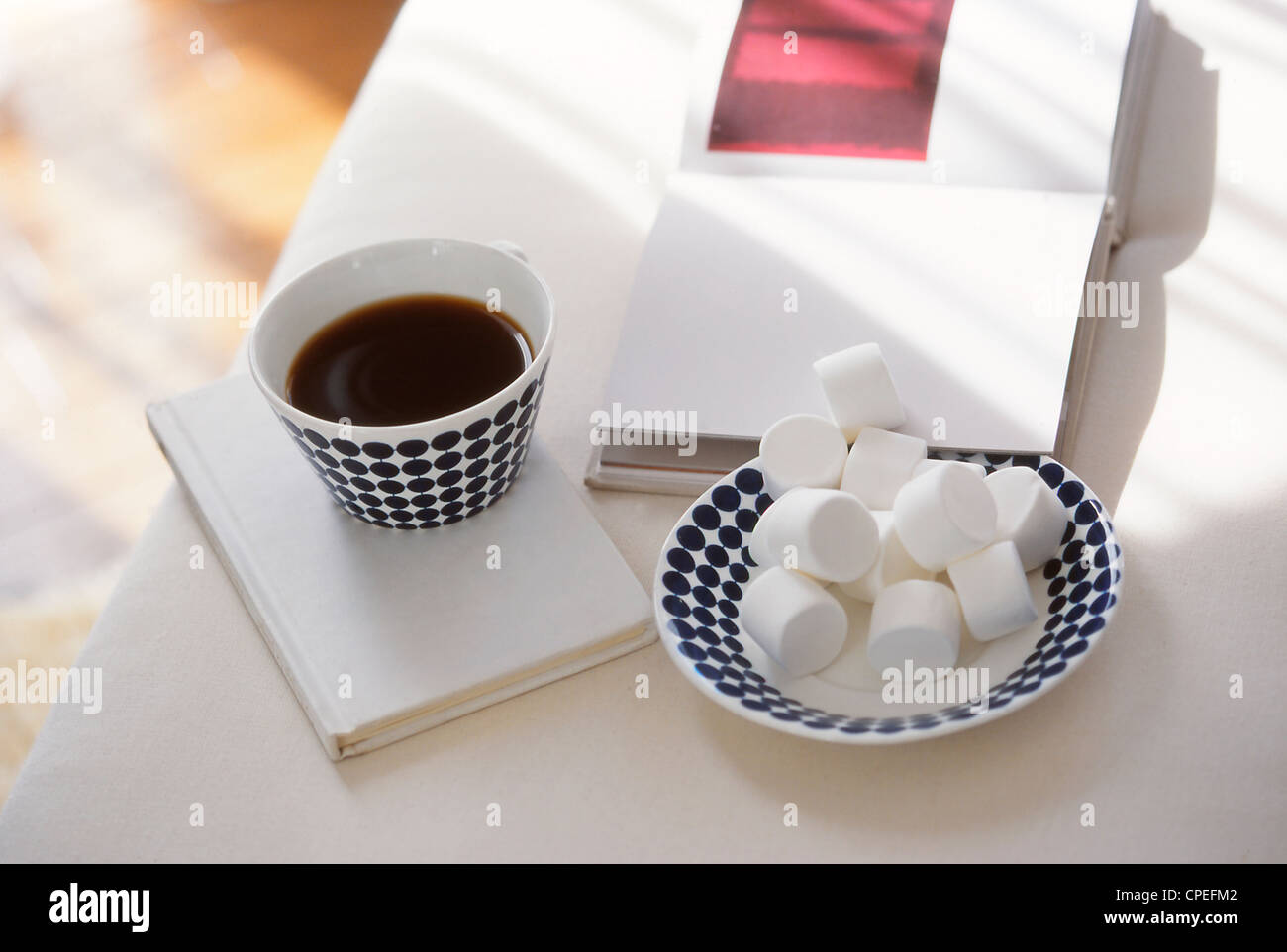 Tea And Cylindrical Sugar Cubes On Table Stock Photo