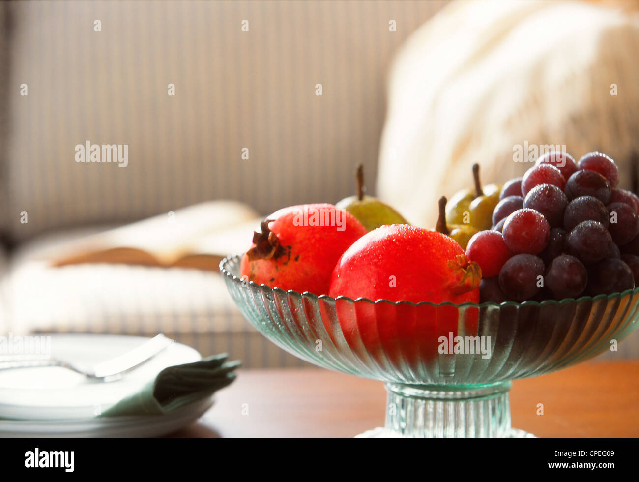 Assorted Fruits In Glass Bowl Stock Photo