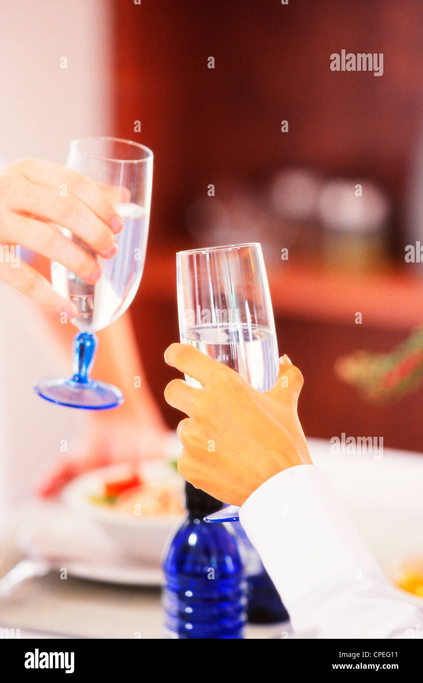 Human Hands Toasting Drinking Glasses Stock Photo