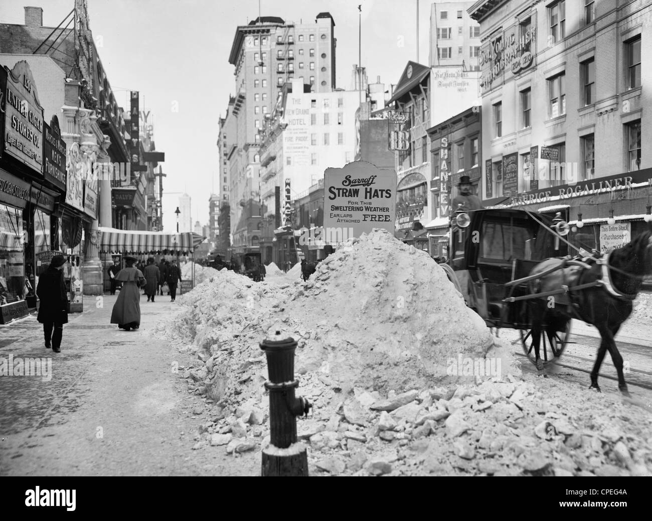 Piles of snow on Broadway, after storm, New York, circa 1905 Stock Photo
