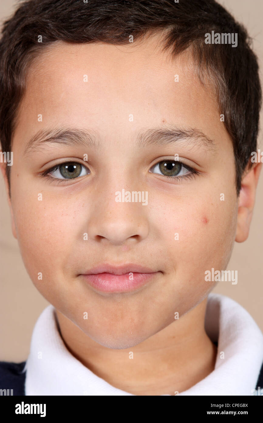 Young boy with brown hair at home Stock Photo - Alamy