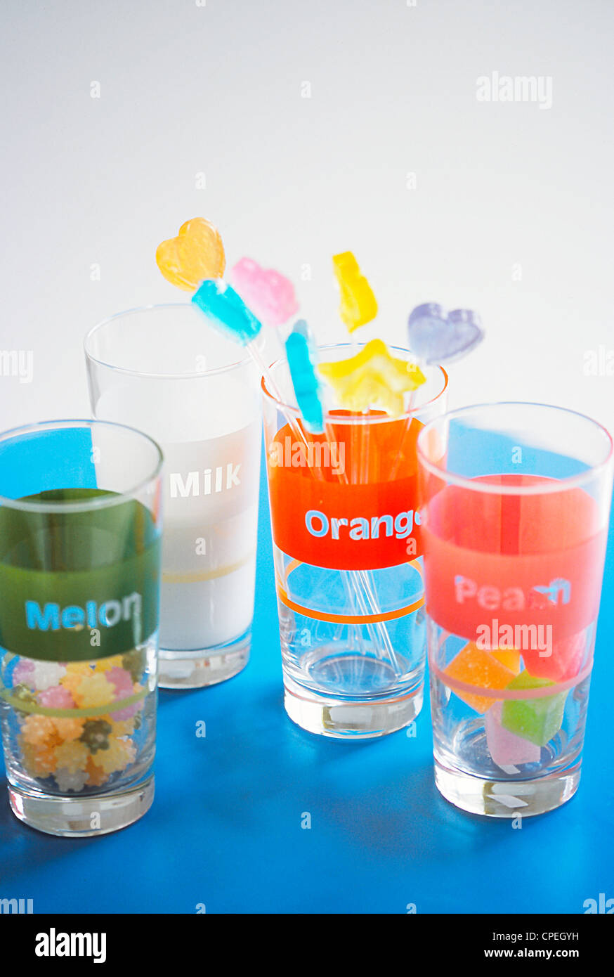 Drinking Glasses With Lollipops and Candies Stock Photo