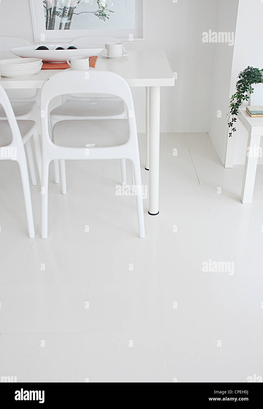Modern Dining Table In White Stock Photo - Alamy