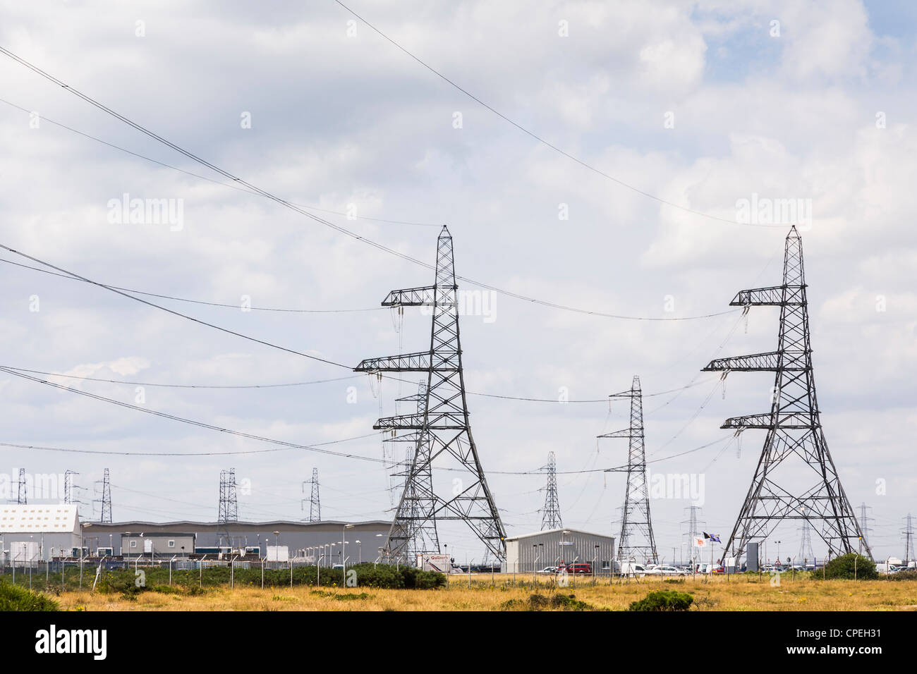 High voltage pylons at Dungeness Nuclear Power Station, Romney Marsh, Kent, England. Stock Photo