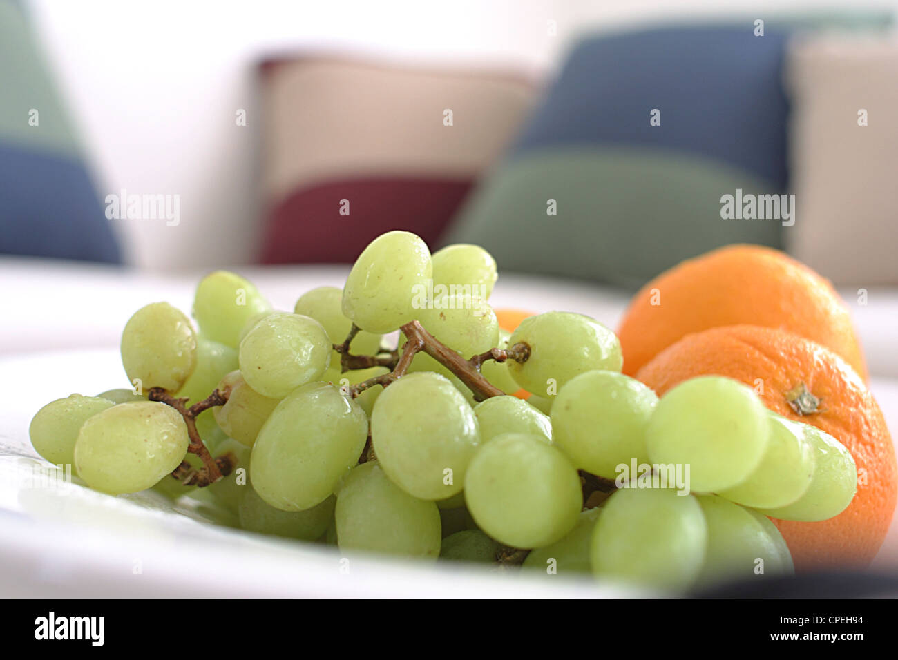 Grapes And Oranges In Bowl Stock Photo Alamy