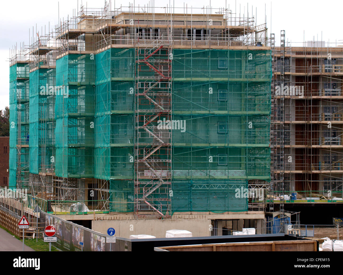 Building covered in scaffolding and netting, Cambridge, UK Stock Photo