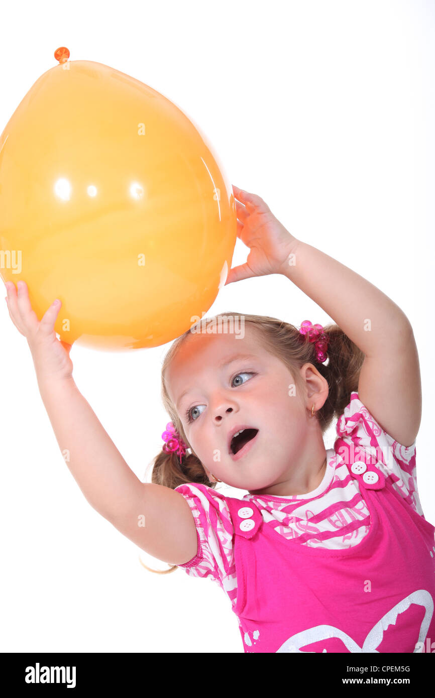 Girl with an orange balloon Stock Photo Alamy