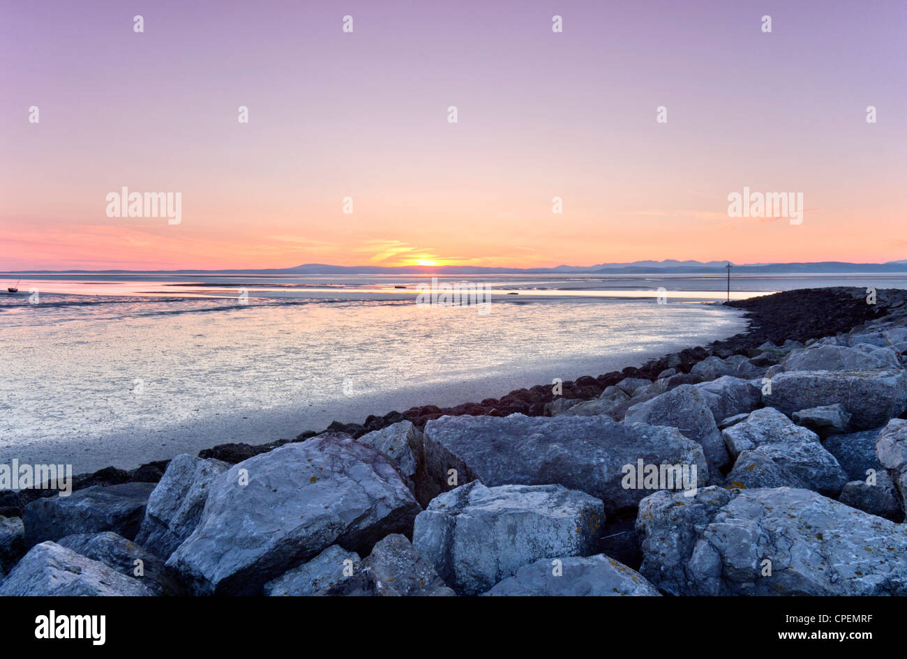 A view of Morecambe Bay at sunset with the Lakeland Fells in the
