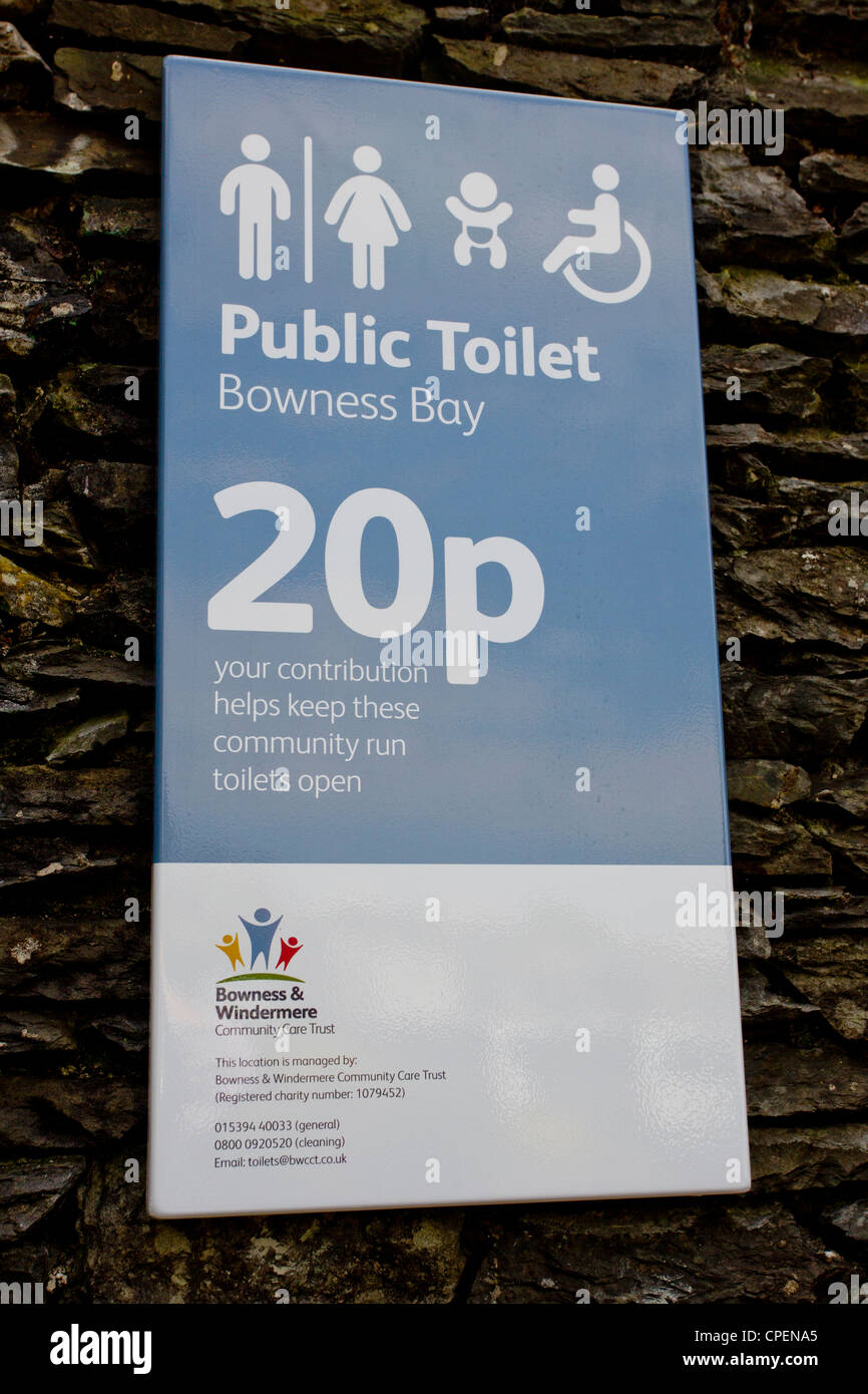Public Toilet Bowness Bay Charge 20p to spend a penny Stock Photo